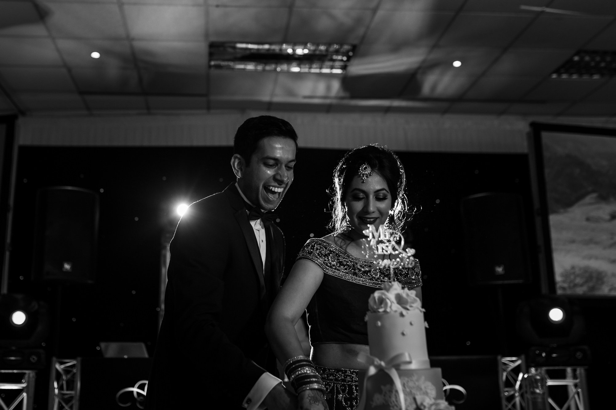 Dunchurch Park Hotel, Asian wedding photographer Midlands, cake cutting