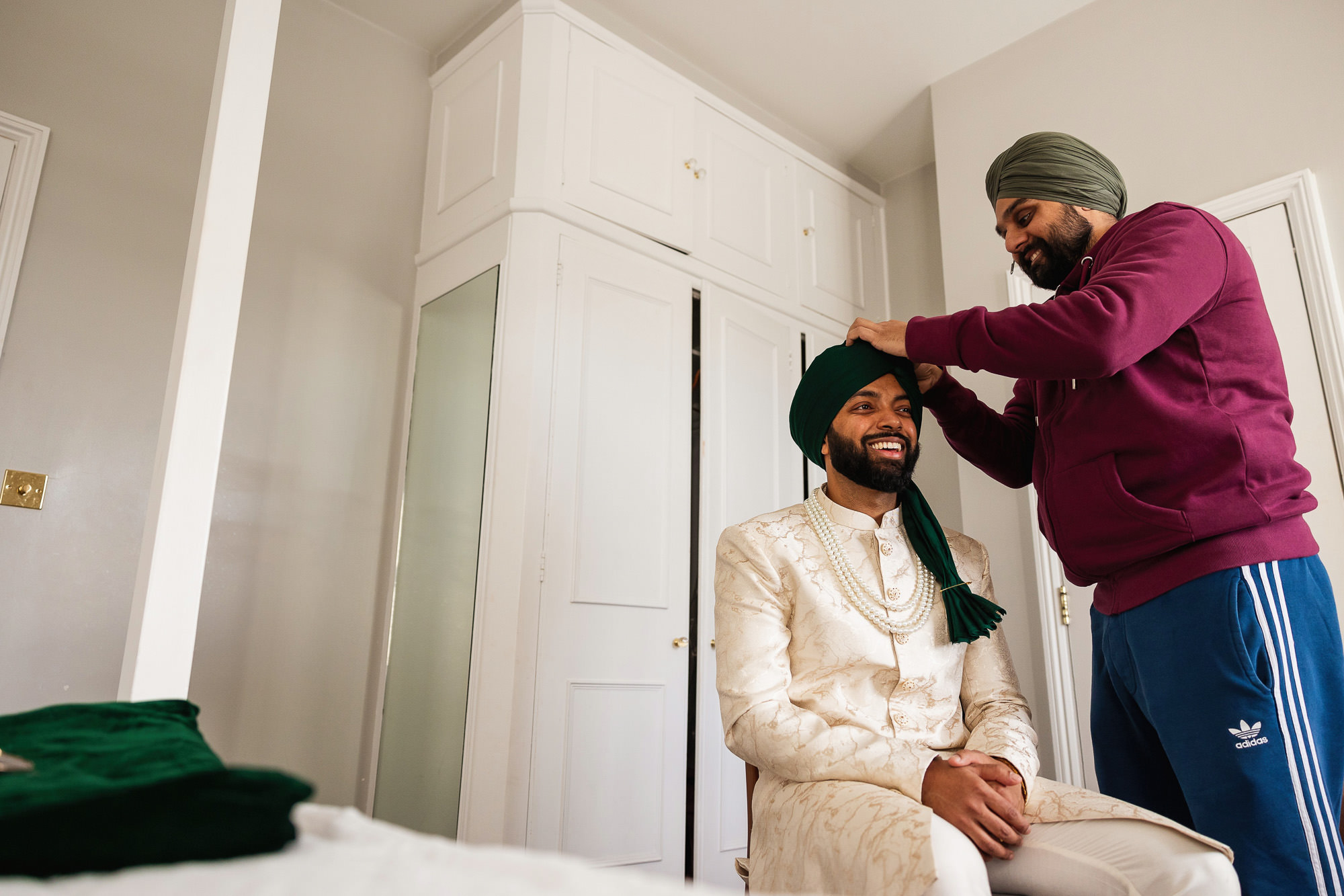 Hindu wedding photographer, Northbrook Park, Farnham, Surrey, fusion wedding, groom getting ready, turban